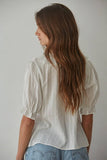 100% Woven Cotton V-Neck Blouse with Ruffle Detail in Off White