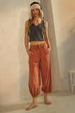 Acid Washed Capri Length Bubble Pants in Washed Rust